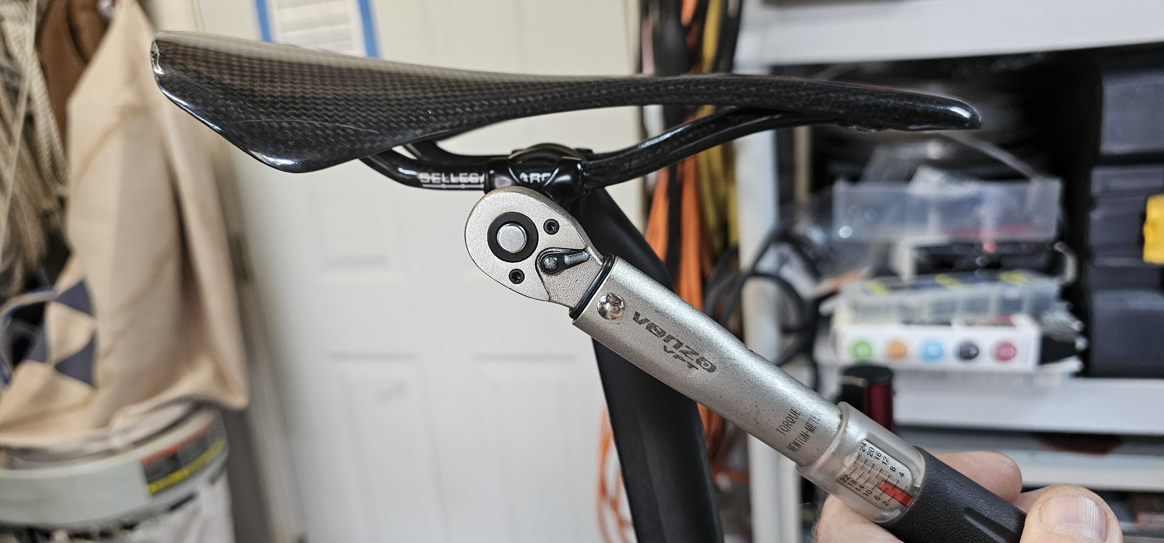 Torque the saddle in place